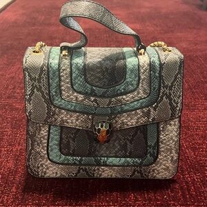 Elegant Handbag with Gold Accents